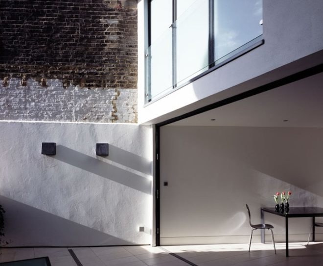 Maida Vale, London, London architecture, Boyarsky Murphy Architects, skinny house, narrow house, sliver house, wedge-shaped site, wedge-shaped building, tinted windows, natural light, split-level, skylight, glass facade