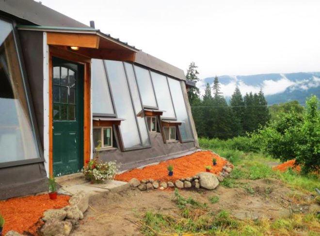 Sandra Burkholder, darfield earthship, tires, old tires, rammed earth, earthship, greywater, graywater, grey water, gray water, hugelkultur, permaculture, sustainable permaculture, permaculture gardening, low impact, low impact house, low-impact, low-impact living, perennials, perennial, perennial garden, raised garden beds, Home Made from Old Tires and Pop Cans, , recycled home, green home, recycled materials, green design, eco design, sustainable design, eco architecture, green architecture