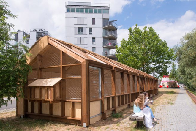 Guinée*Potin Architectes, Footcheball, long playground, thatched building, Nantes