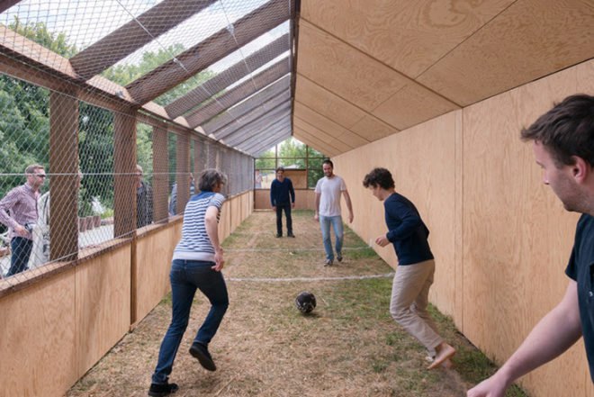 Guinée*Potin Architectes, Footcheball, long playground, thatched building, Nantes