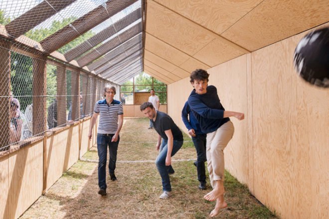 Guinée*Potin Architectes, Footcheball, long playground, thatched building, Nantes
