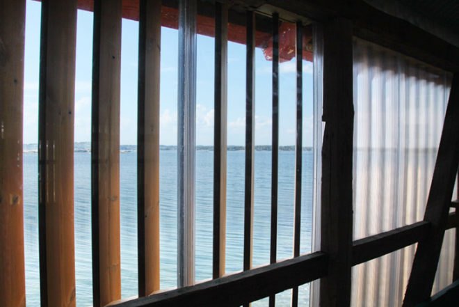 Snøhetta, renovated, Hudøy Cabin, Norway, corrugated polycarbonate, recycled wood, green renovation