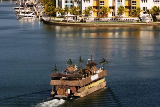 Debra Dawson, Miami-style, Tikki Beach Barge, party boat, drifting tropical island, palms, fake grass,