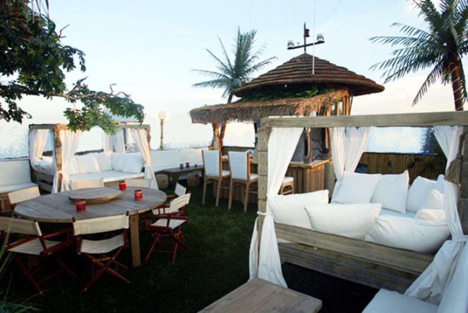Debra Dawson, Miami-style, Tikki Beach Barge, party boat, drifting tropical island, palms, fake grass,