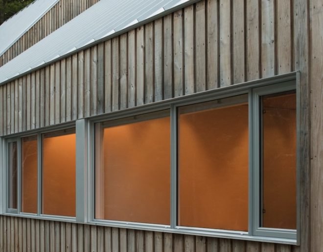 Omar Gandhi, OSB, plywood, Moore Studio, Nova Scotia, Canada, Canadian architecture, industrial fixtures, concrete flooring, nova scotia vernacular, clerestory window, natural light, wood cabin, cabin, artists retreat, artist studio