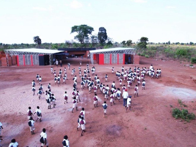 Malawi, shipping containers, architecture for a change, solar energy, rainwater harvesting, primary school, off grid, John Saaimen, prefab, prefab school, bamboo ceiling, shade netting, cross ventilation, sustainable architecture, prefab architecture, Legson Kayira Community Center & Primary School