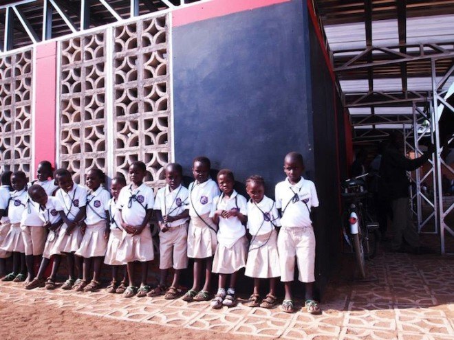 Malawi, shipping containers, architecture for a change, solar energy, rainwater harvesting, primary school, off grid, John Saaimen, prefab, prefab school, bamboo ceiling, shade netting, cross ventilation, sustainable architecture, prefab architecture, Legson Kayira Community Center & Primary School