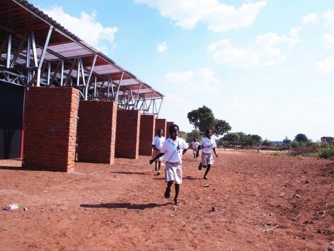 Malawi, shipping containers, architecture for a change, solar energy, rainwater harvesting, primary school, off grid, John Saaimen, prefab, prefab school, bamboo ceiling, shade netting, cross ventilation, sustainable architecture, prefab architecture, Legson Kayira Community Center & Primary School