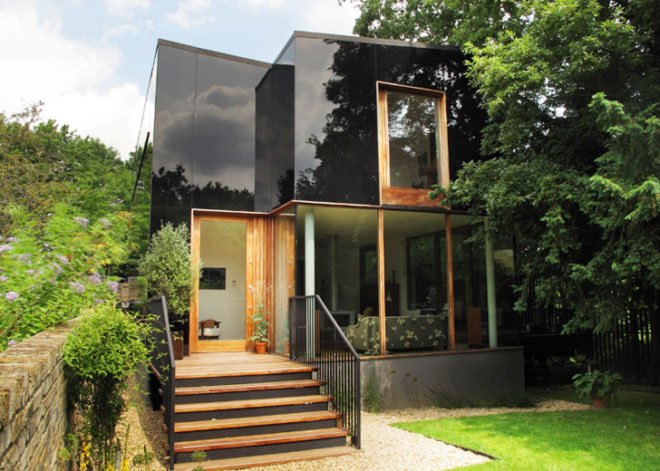 Ian McChesney, London architecture, black glass, glass facade, London architects, wood-burning stove, small houses, Victorian architecture London, Invisible home