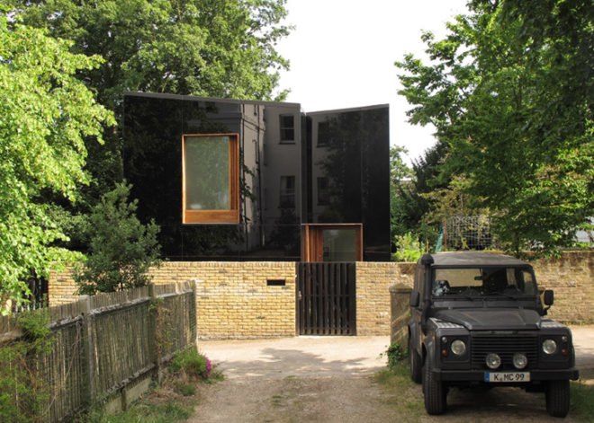 Ian McChesney, London architecture, black glass, glass facade, London architects, wood-burning stove, small houses, Victorian architecture London, Invisible home