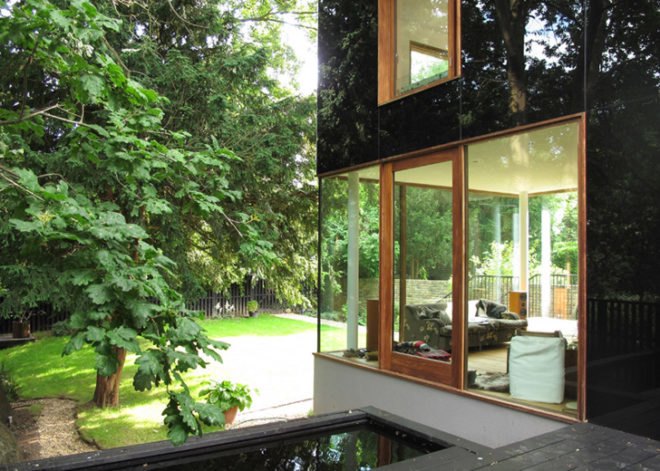Ian McChesney, London architecture, black glass, glass facade, London architects, wood-burning stove, small houses, Victorian architecture London, Invisible home