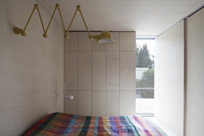 HPSA, Hammerschmid, Pachl, Seebacher Architekten, Teichhaus, spruce, Swedish mud color, Austria, Austrian architecture, natural swimming pool, elevated house, white oiled birch plywood, plywood, spruce board, gray fiberboard, open plan layout, natural light, minimal site disturbance, wooden deck