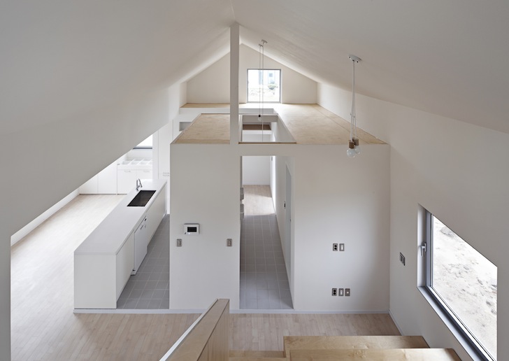 twin peaks house, south korea, mountain-inspired architecture, zigzag roof, apparat-c, children play space, open plan layout, gable roof, high ceilings,