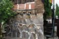 Wheel Story House, Ghana, Accra, Sammy Mensah Ansah, upcycle, reclaimed wood, recycled materials, reclaimed materials, house made from trash, trash construction materials, upcycled construction materials, west africa