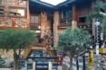 Wheel Story House, Ghana, Accra, Sammy Mensah Ansah, upcycle, reclaimed wood, recycled materials, reclaimed materials, house made from trash, trash construction materials, upcycled construction materials, west africa