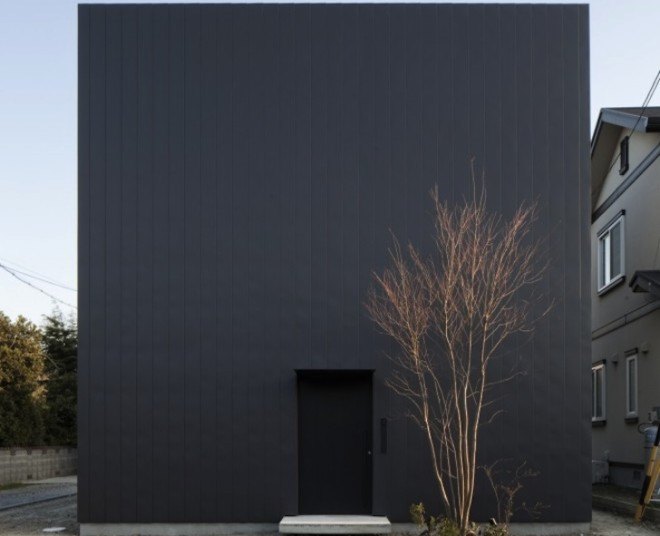 japanese architecture, Ant House, Japan, Shizuka Prefecture, mA-style architects, gable roofed structure, home within a home, monolithic architecture, metal clad architecture, contemporary home, plywood, larch plywood, natural light