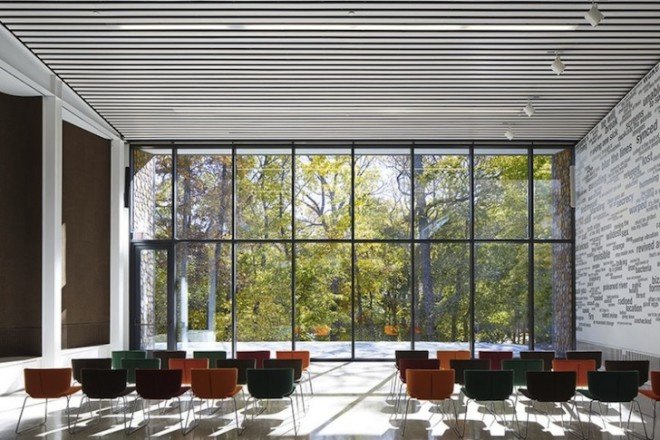 Studio Gang, LEED Gold, Arcus Center, Kalamazoo, locally sourced wood, timber discs, cordwood masonry, wood masonry, Arcus Center for Social Justice Leadership, Kalamazoo College, Michigan, y-shaped building, natural daylight, glazed end wall, communal hearth, tri-axial plan, human rights, social justice,
