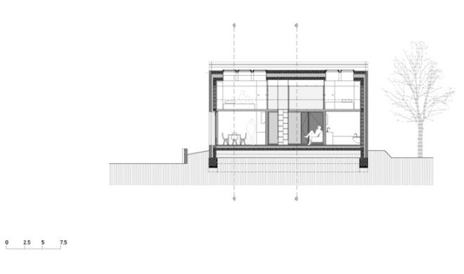 Dekleva Gregorič Arhitekti, Compact Karst House, Karst, Slovenia, Karst Plateau, stony house, monolithic architecture, contemporary architecture, untreated wood, wooden volumes, limestone, pitched roof, concrete, skylights