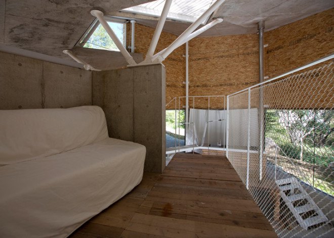 Double Negatives Architecture, Japan, Japanese architecture, OSB boards, concrete house, concrete home, mountain home, chipboard house, residential architecture, angular roof, Nagano house, forest house