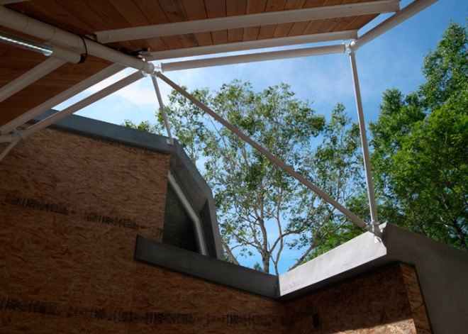Double Negatives Architecture, Japan, Japanese architecture, OSB boards, concrete house, concrete home, mountain home, chipboard house, residential architecture, angular roof, Nagano house, forest house
