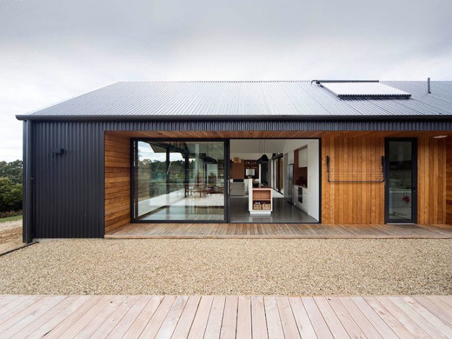 gabled roof, Lookout House, Room 11, Tasmania, Australia, Tasman Island, Port Arthur, gabled rooftop, barnyard typology, farmhouse typology, courtyard, farmhouse, barn door, timber, cedar, metal roof, solar heat gain,