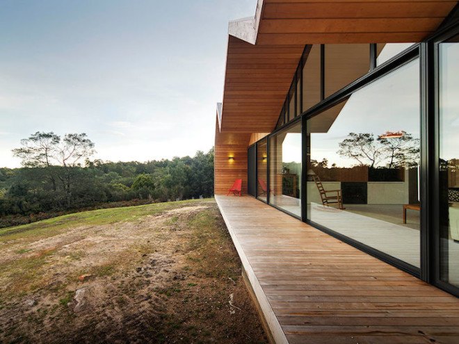 gabled roof, Lookout House, Room 11, Tasmania, Australia, Tasman Island, Port Arthur, gabled rooftop, barnyard typology, farmhouse typology, courtyard, farmhouse, barn door, timber, cedar, metal roof, solar heat gain,