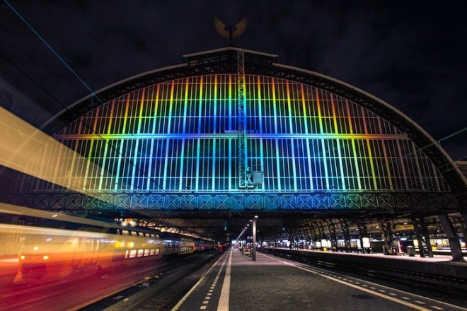 Daan Roosegaarde, Amsterdam Central Station, art installation, liquid crystal technology, projected light, rainbow, UNESCO Year of the Light, Year of the Light, Rainbow Station, Amsterdam,
