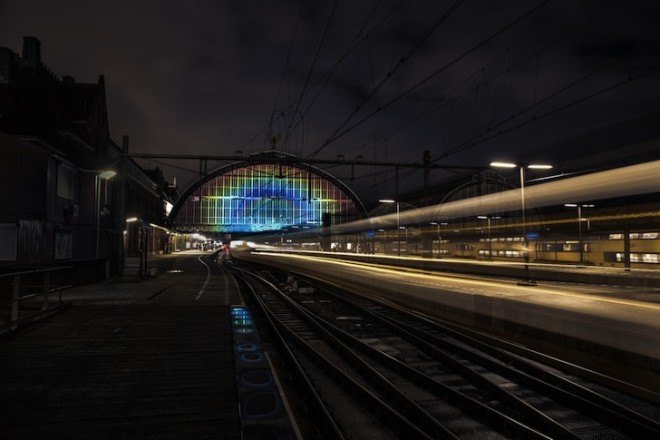 Daan Roosegaarde, Amsterdam Central Station, art installation, liquid crystal technology, projected light, rainbow, UNESCO Year of the Light, Year of the Light, Rainbow Station, Amsterdam,