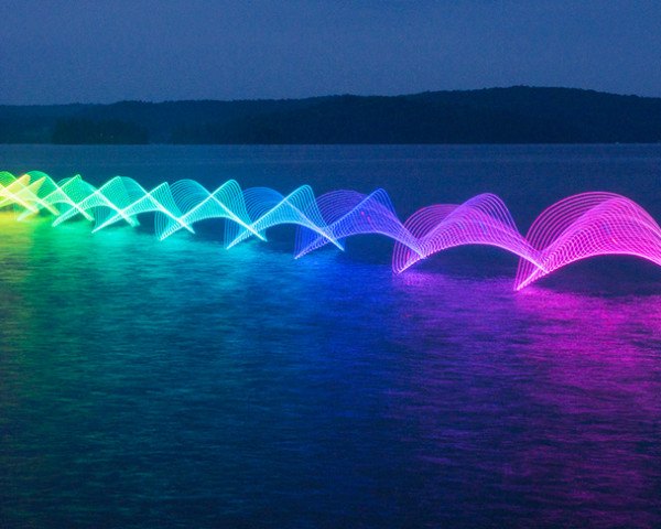 Stephen Orlando, kayakers' motions, photography in motion, LED lights, Canadian artist, long exposure photography