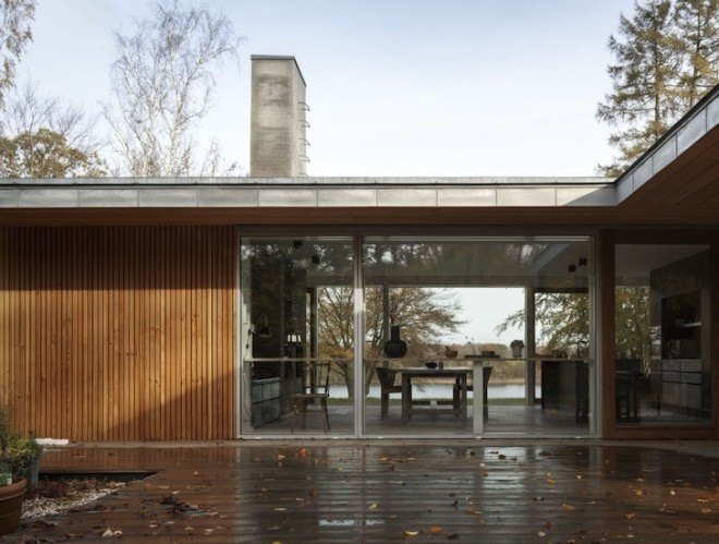 Villa Buresø, Denmark, Danish architecture, pine-clad architecture, Douglas pine, Slangerup, Mette Lange Architects, geothermal energy, annex, energy efficient architecture, skylights, lakeside architecture, floor to ceiling windows,