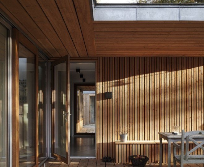 Villa Buresø, Denmark, Danish architecture, pine-clad architecture, Douglas pine, Slangerup, Mette Lange Architects, geothermal energy, annex, energy efficient architecture, skylights, lakeside architecture, floor to ceiling windows,