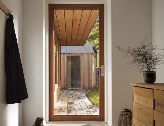 Villa Buresø, Denmark, Danish architecture, pine-clad architecture, Douglas pine, Slangerup, Mette Lange Architects, geothermal energy, annex, energy efficient architecture, skylights, lakeside architecture, floor to ceiling windows,