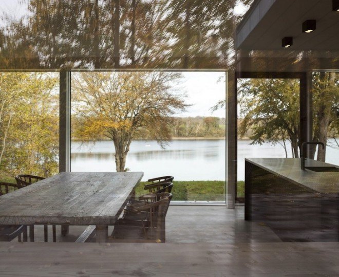 Villa Buresø, Denmark, Danish architecture, pine-clad architecture, Douglas pine, Slangerup, Mette Lange Architects, geothermal energy, annex, energy efficient architecture, skylights, lakeside architecture, floor to ceiling windows,