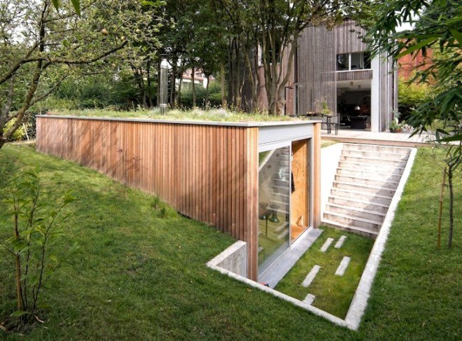 Belgium, workshop, l’escaut, atelier, skylight, natural light, larch, wood workshop, green roof, l’escaut architecture, glass sliding doors, raw concrete, sunken architecture, wooden office, office, tiny office, tiny building, white concrete, prairie grass