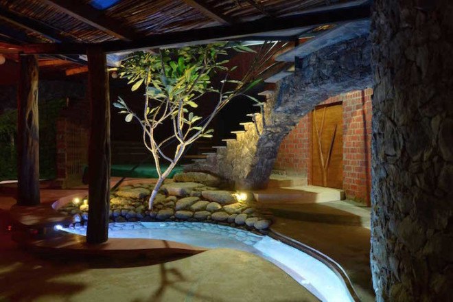 Brick House, iStudio Architecture, Wada, Mumbai, India, local materials, locally sourced materials, natural light, brick, stone, wood, bamboo, ferro-concrete, rat-trap bond, arched windows, passive cooling,