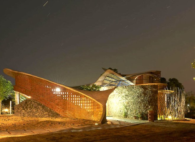 Brick House, iStudio Architecture, Wada, Mumbai, India, local materials, locally sourced materials, natural light, brick, stone, wood, bamboo, ferro-concrete, rat-trap bond, arched windows, passive cooling,