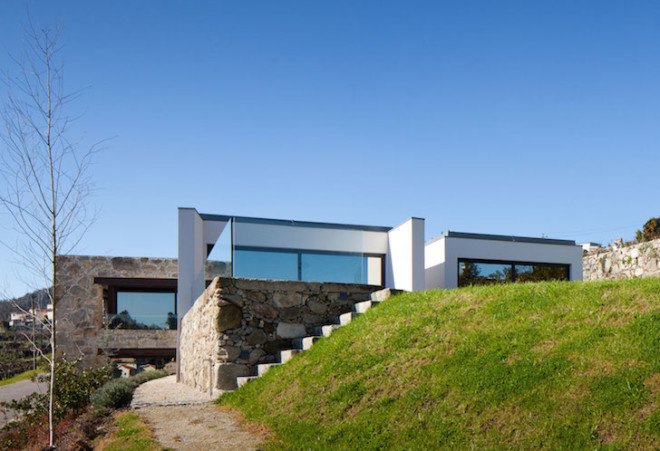Casa RM, Portugal, FCC Arquitectura, renovated farmhouse, former farmhouse, stone, stone facade, modern architecture, contemporary architecture, natural light, stone walls, contemporary design,
