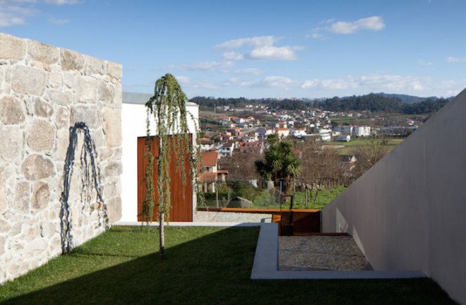 Casa RM, Portugal, FCC Arquitectura, renovated farmhouse, former farmhouse, stone, stone facade, modern architecture, contemporary architecture, natural light, stone walls, contemporary design,
