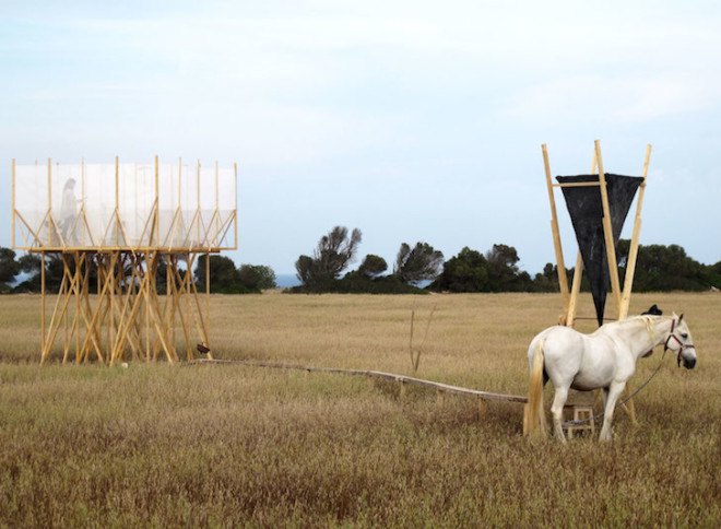 Gartnerfuglen, Grooming Retreat, horse grooming, Marian de Delás, horses, spain, timber structure, elevated structure, horse station, mosquito net, white netting, natural light, barley field, timber platform, Mallorca