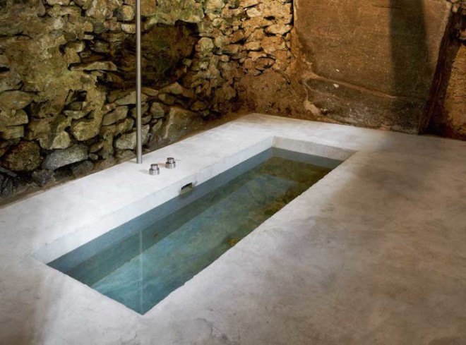 Linescio, Linescio house, Buchner Bründler Architekten, Switzerland, house within a house, house inside a house, minimalist, summer home, holiday home, concrete, fireplace, natural cooling, renovation