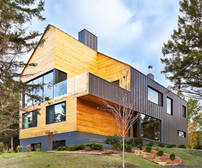 MU architects, open tread stairs, Malbaie VIII Residence La Grange, Malbaie VIII, St. Lawrence River, white cedar, dark gray metal, metal cladding, timber home, Charlevoix, outdoor terrace, barn-inspired architecture, cathedral ceiling, natural light,