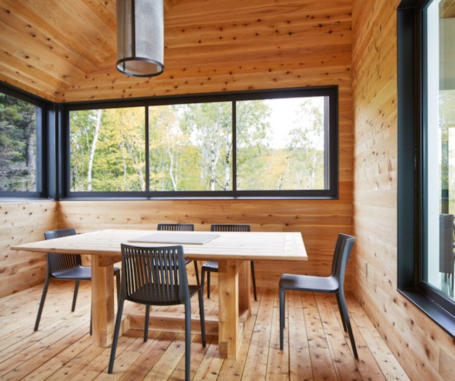 MU architects, open tread stairs, Malbaie VIII Residence La Grange, Malbaie VIII, St. Lawrence River, white cedar, dark gray metal, metal cladding, timber home, Charlevoix, outdoor terrace, barn-inspired architecture, cathedral ceiling, natural light,