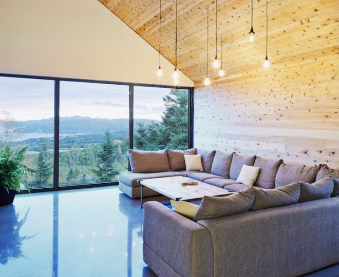 MU architects, open tread stairs, Malbaie VIII Residence La Grange, Malbaie VIII, St. Lawrence River, white cedar, dark gray metal, metal cladding, timber home, Charlevoix, outdoor terrace, barn-inspired architecture, cathedral ceiling, natural light,