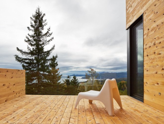 MU architects, open tread stairs, Malbaie VIII Residence La Grange, Malbaie VIII, St. Lawrence River, white cedar, dark gray metal, metal cladding, timber home, Charlevoix, outdoor terrace, barn-inspired architecture, cathedral ceiling, natural light,