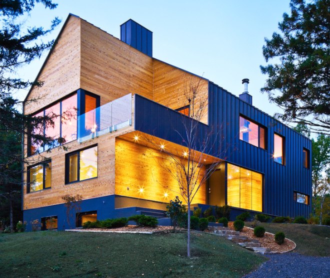 MU architects, open tread stairs, Malbaie VIII Residence La Grange, Malbaie VIII, St. Lawrence River, white cedar, dark gray metal, metal cladding, timber home, Charlevoix, outdoor terrace, barn-inspired architecture, cathedral ceiling, natural light,