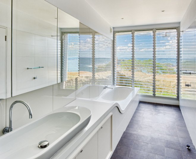Utz Sanby Architects, Queenscliff House, Sydney, Australia, energy efficiency, energy efficient architecture, energy efficient house, wedge-shape home, cliffside home, natural light, glazing, ocean views, panoramic views, floor to ceiling glazing, thermal efficiency, hydronic under-floor heating, rainwater collection, rainwater tanks
