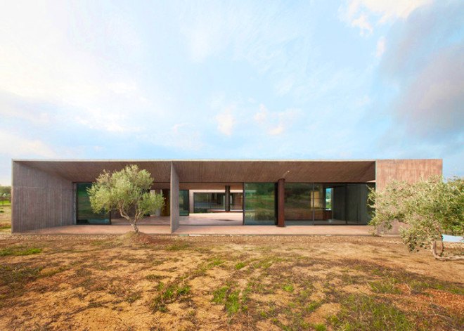 Tense Architecture Network, concrete home, residence in Megara, Greece, Greek architects, courtyard, concrete house, glass facade, open-plan living room, olive grove, green architecture