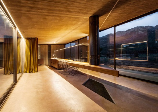 Tense Architecture Network, concrete home, residence in Megara, Greece, Greek architects, courtyard, concrete house, glass facade, open-plan living room, olive grove, green architecture