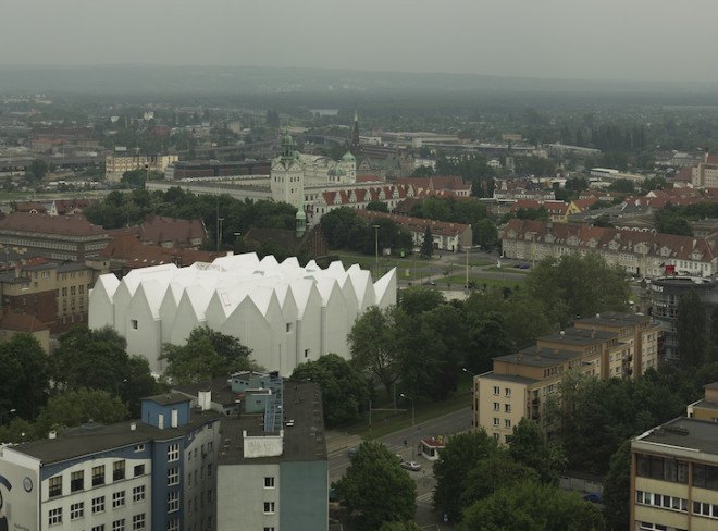 Barozzi Veiga, Philharmonic Hall, concert Hall, Poland, Szczecin, organ, crystalline architecture, gold leaf, triangular panels, Fibonacci sequence, minimalist design, symphony hall,
