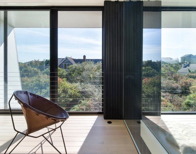 Hamptons house, country house, waterfront, NY waterfront, flood-resistant house, floods, water-resistant house, Bates Masi Architects, New York architecture, glass walls, FEMA, green architecture, daylit architecture